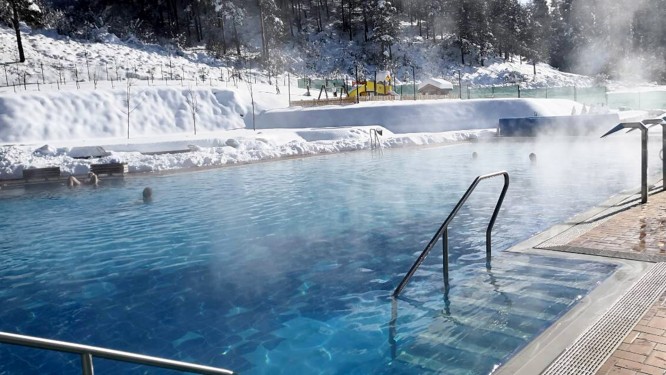 The outdoor swimming pool with hot mineral water